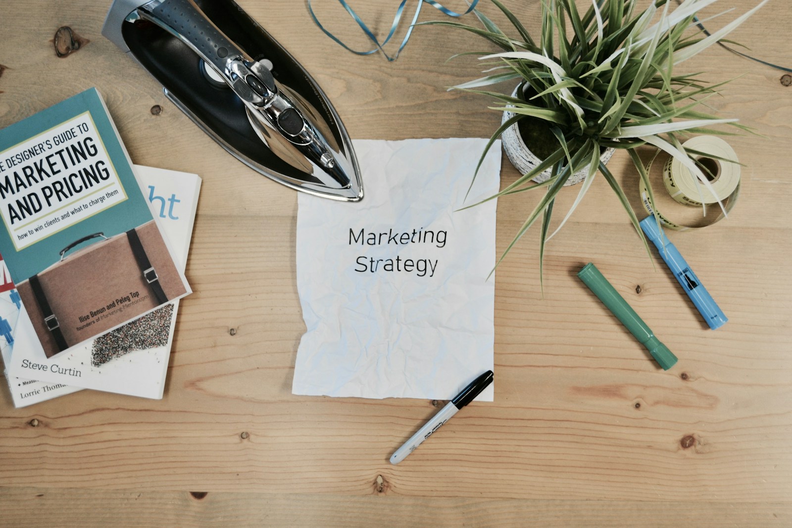 Photo by Campaign Creators white printing paper with Marketing Strategy text